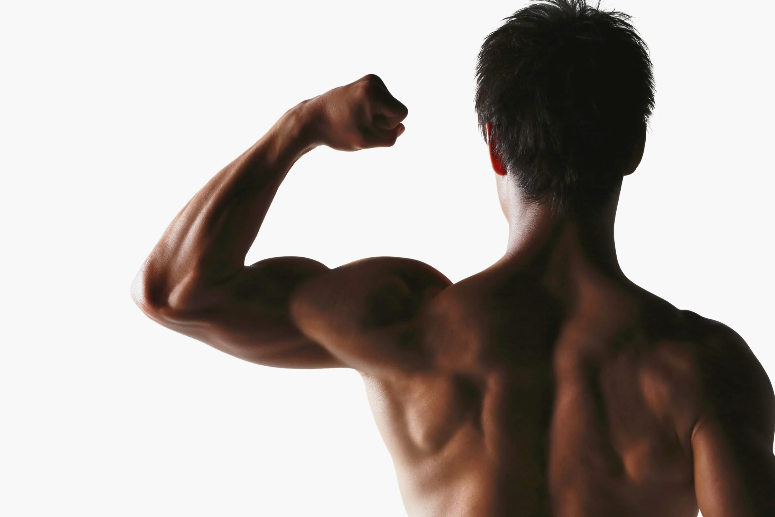 Muscular man showing his back and flexing muscles