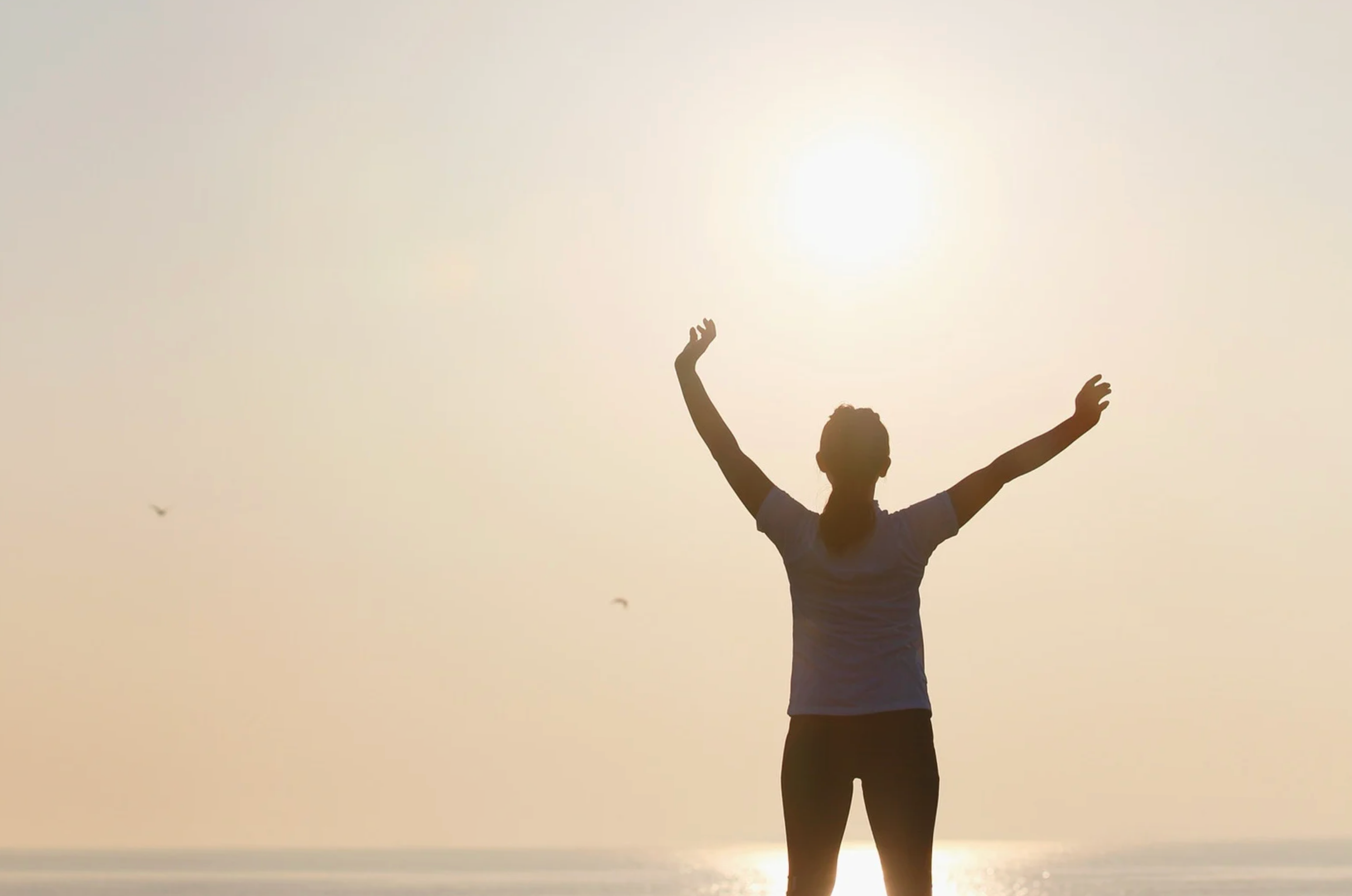 Lady facing away towards the sun