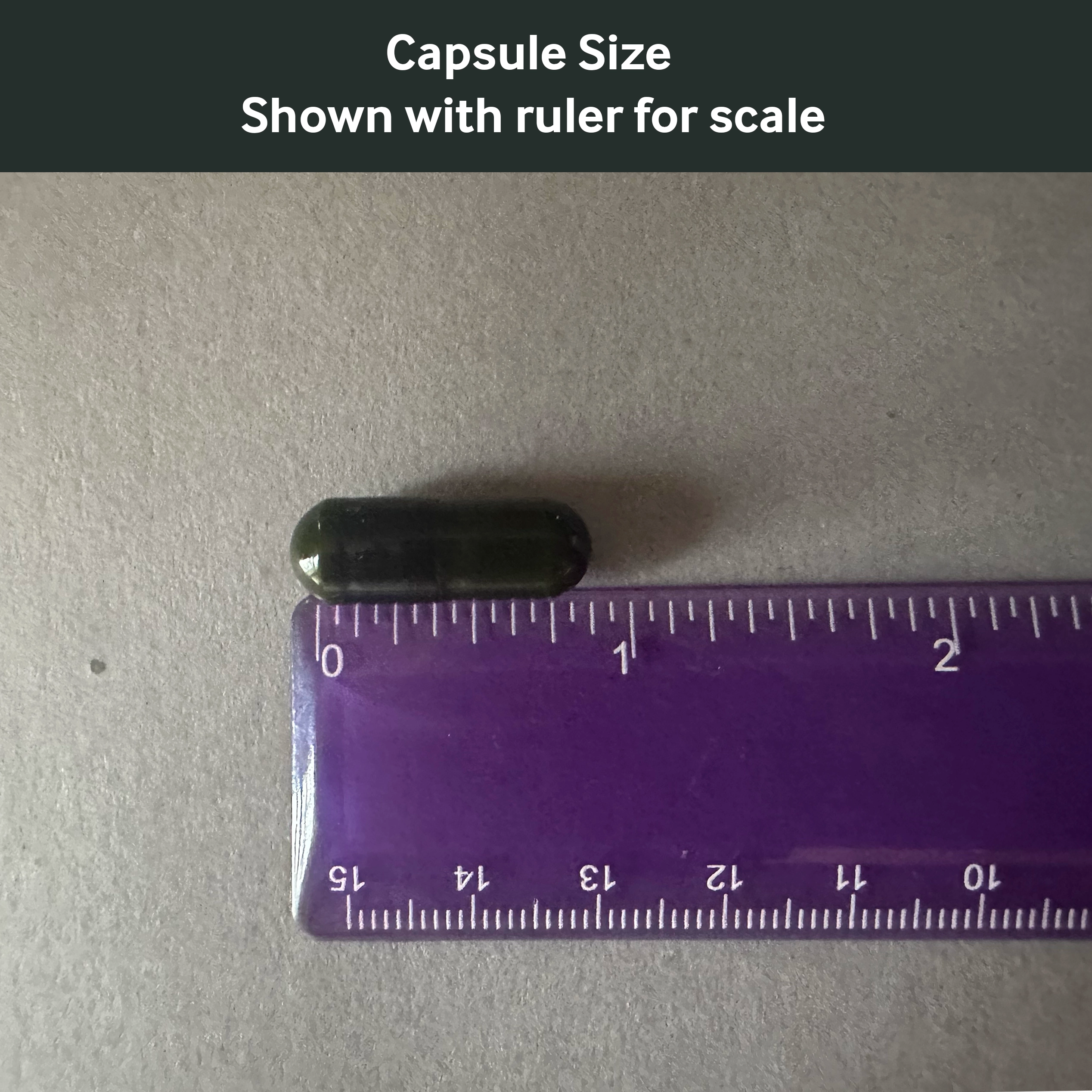 Dr. Murray's K2 D3, A and E Capsule size shown with a ruler for scale on a gray background