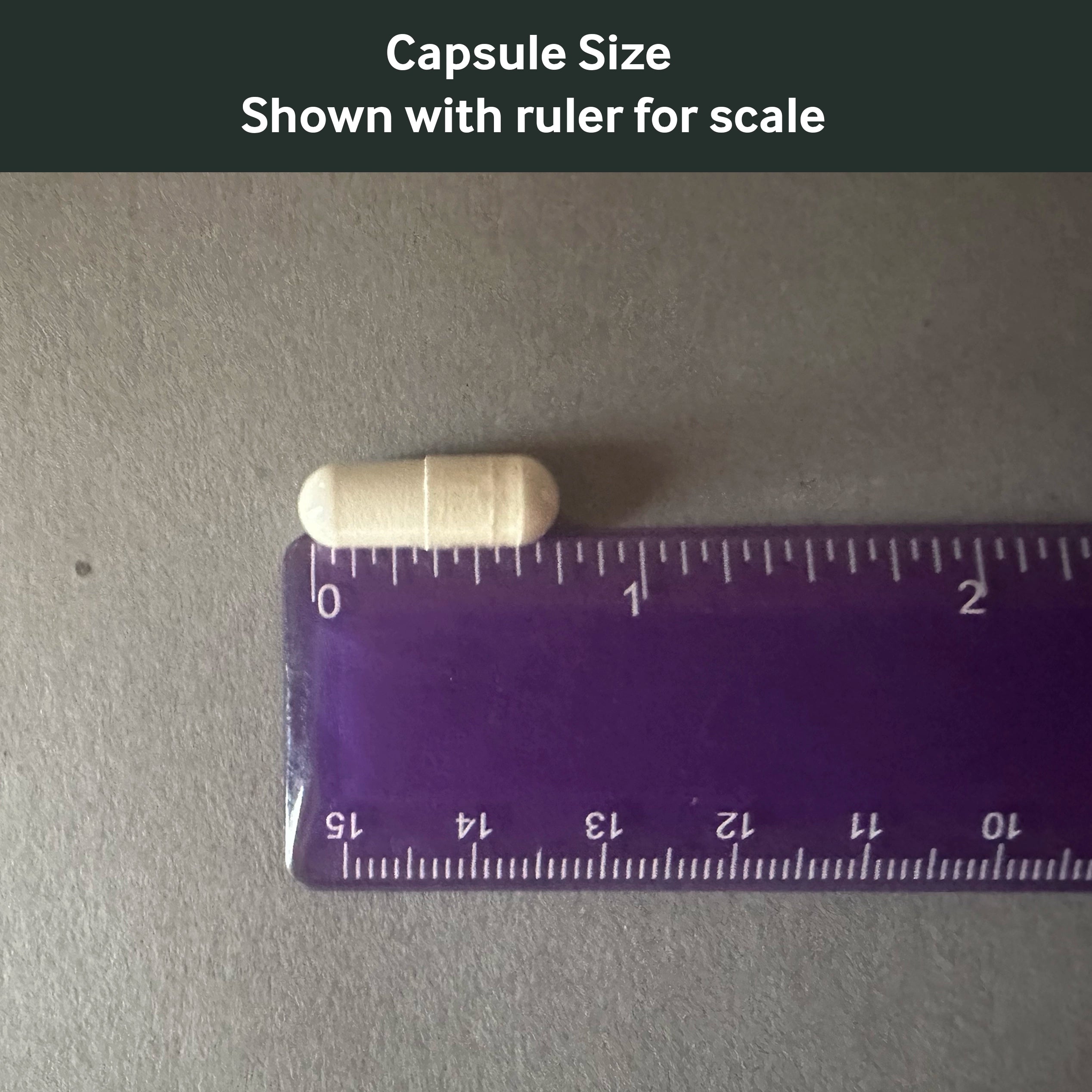 Dr. Murray's Lithium 5mg capsule size shown with a ruler for scale on a gray background