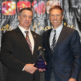Dr. Murray receiving an award at the  Natural Factors’ Presidents Award Press Release