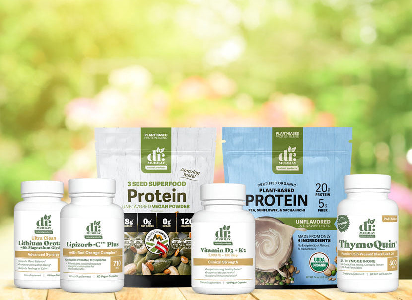 Assorted Dr. Murray products on a wooden surface with a blurred natural background