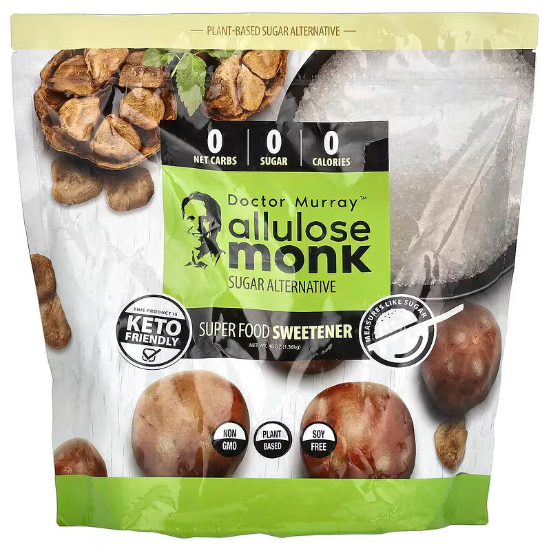 Packaging of Doctor Murray allulose monk sweetener with nuts and a spoon on a white background
