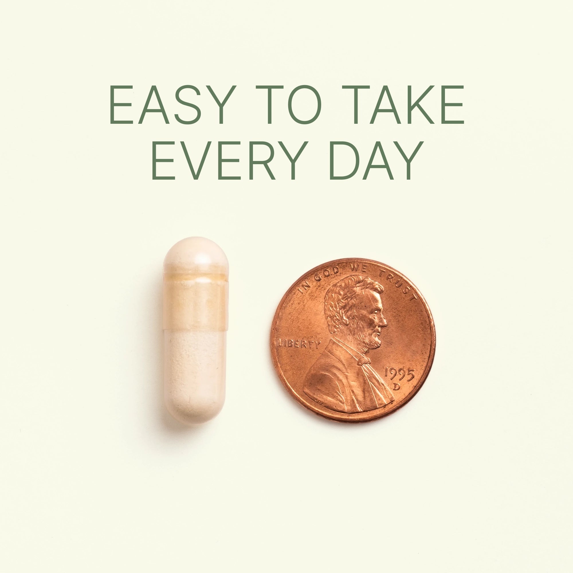 Dr. Murray Serrapeptase capsule is shown next to a U.S. penny for size comparison