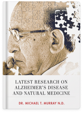 Book cover with a vintage-style illustration of a man's head and a puzzle piece, titled 'Latest Research on Alzheimer's Disease and Natural Medicine' by Dr. Michael T.