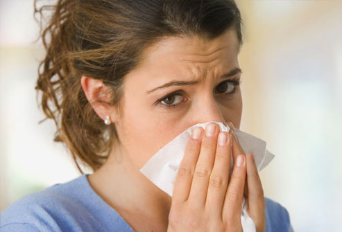 AA-photolibrary_rf_photo_of_woman_blowing_nose