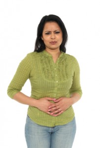 Indian woman with a stomach ache