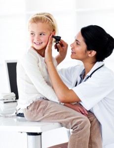 Cute little girl attending a medical check-up