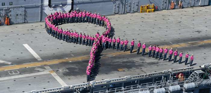 sailors_stand_in_a_pink_ribbon_formation_at_sea700.